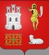 coat of arms showing lamb, castle and other figures on red background