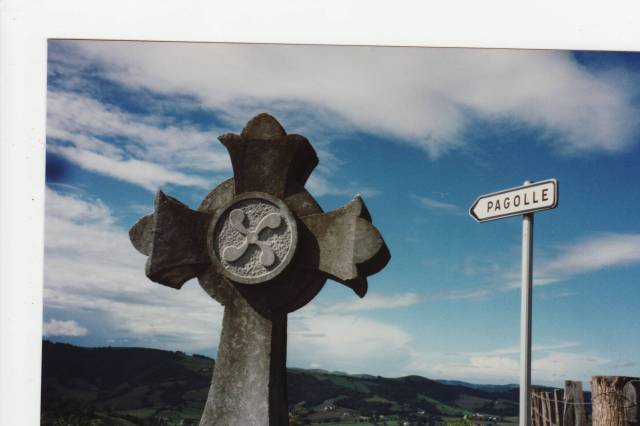 Modern Basque cross on country road.